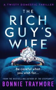 Dark Blue cover with large title The Rich Guy's Wife. Large Diamond ring in the center, set in blue velvet.