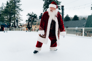 Santa ice skating with guests