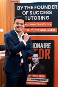 Author of The Millionaire Tutor smiling at his book launch event.