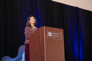 TxDOT CIO Anh Selissen stands at a podium speaking to attendees of the 2025 GAACC Ovation Gala.