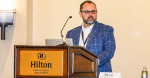 Roy Lax moderating a panel discussion on fiber build information, forecasts, and funding challenges at the 2025 Virginia Utility Safety Conference in Virginia Beach.