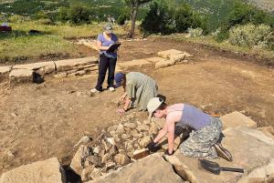 Student participants in the Matohasanaj Archaeological Project work on the research site.