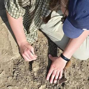 Alyssa O'Quinn ’26 uncovers an artifact.