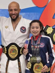 Madison Knight with Coach Samuel Diaz III showcasing their World Grand Championship medals at the World Martial Arts Games, 2025.