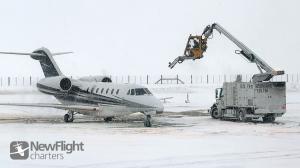 Private Jet De-icing before departure from Jackson Hole Airport