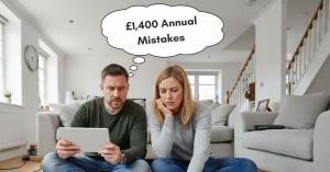 couple seating on the floor checking their heating bill on an ipad