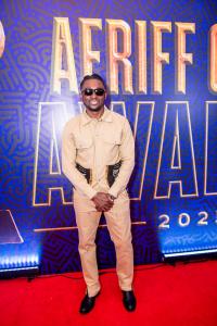 Bambadjan Bamba wearing Bogolonfini fashion brand on the red carpet at the 2025 Africa International Film Festival