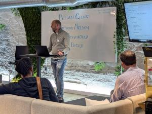 Tony Melson presenting at AI Tinkerers