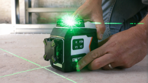 The Maestro laser level held at a construction site