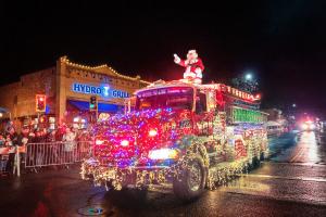 Santa on a lighted fire truck