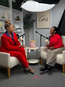 Author Shonda Scott being interviewed by Oprah Daily following the release of her book.