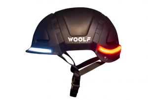 Black helmet with lights on, showcasing the Woolf helmet in action