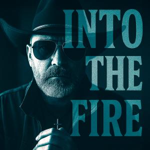 A cinematic, blue-toned portrait of Kendall Whelpton wearing a cowboy hat and sunglasses, holding a cross necklace in his hands. The bold textured title “INTO THE FIRE” appears beside him, matching the album’s dramatic and faith-driven aesthetic.