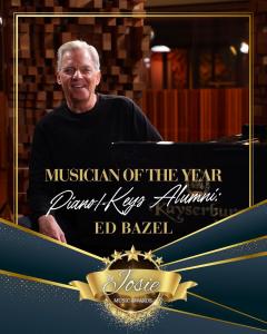 black poster, gold writing about awards with pic of Ed