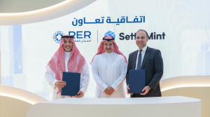 SettleMint CEO, Adam Popat, signs with RER's CEO, Dr Mohammad AlSuliman, and CTO, Yasser AlKhathlan, to develop national real estate registry tokenization solution