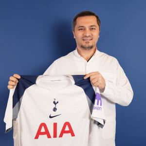 Elithair's Dr Balwi holds a Tottenham Hotspur football shirt